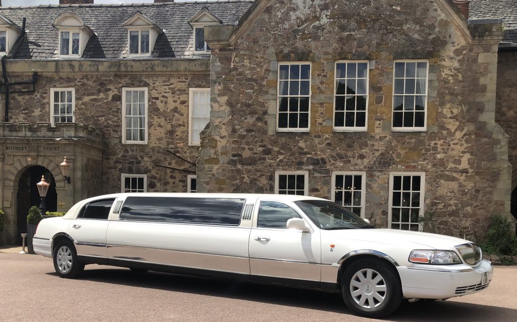 Northampton Lincoln Town car beside park
