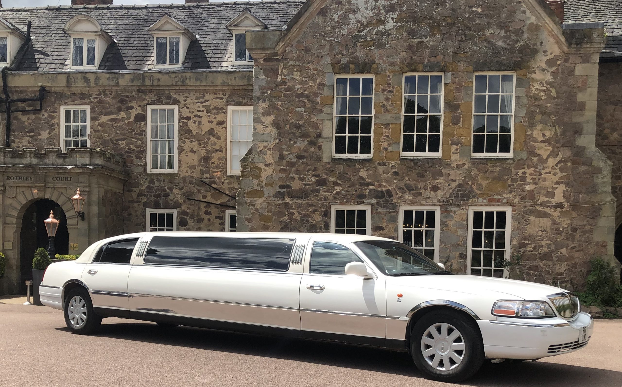 Northampton Lincoln Town car beside park